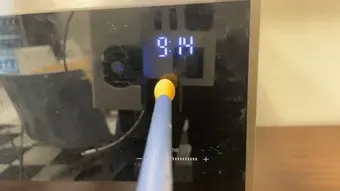 The sensor probe touching microwave (glass)