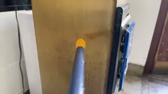 The sensor probe touching pole (brass)