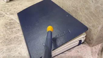 The sensor probe touching book (leather)