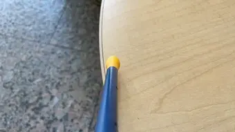 The sensor probe touching table (timber)